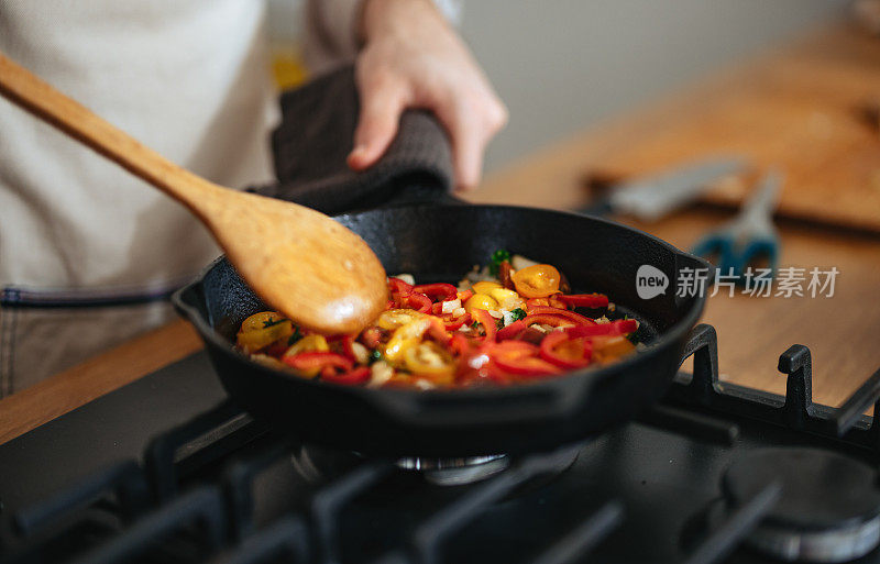Close Up Photo Of Manâs Hands Preparing Healthy Lunch In The Pan At Home